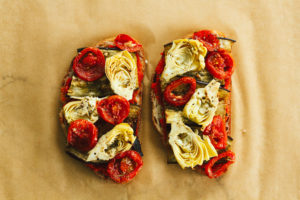 Eggplant, Artichoke, and Tomato Bread Pizza