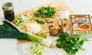 Sausage Mushroom Leek Pizza with Arugula and Fig Balsamic Reduction