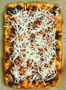 Artichoke, Kalamata, Sun-dried Tomato Pesto Focaccia Pizza