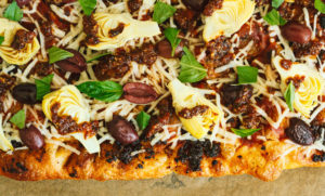 Artichoke, Kalamata, Sun-dried Tomato Pesto Focaccia Pizza