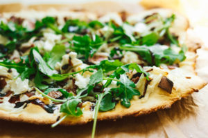 Fig, Bacon, Cashew Chive Cheese with Arugula and a Fig Balsamic Glaze