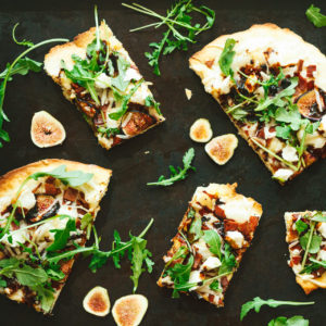 Fig, Bacon, Cashew Chive Cheese with Arugula and a Fig Balsamic Glaze