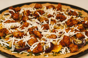 Roasted Pumpkin, Fennel, and Maple Tempeh Sausage Pizza with Pesto