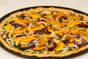 Roasted Pumpkin, Fennel, and Maple Tempeh Sausage Pizza with Pesto