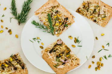 Pistachio, Rosemary, and Shallot Lavash Pizza with Balsamic Reduction